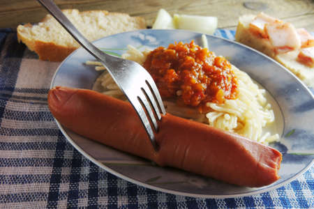 Pasta with sausage, bacon and bread. sauceの写真素材