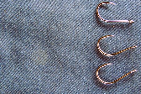 fishing tackle on a wooden table. .の写真素材