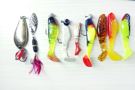 Colourful fishing bait fish, close-up on white backgroundの写真素材