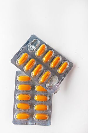 Medical pill tablet isolated on white, clipping path includedの写真素材