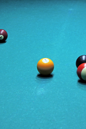 Billiard table with balls. Close-up. Narrow depth of field.