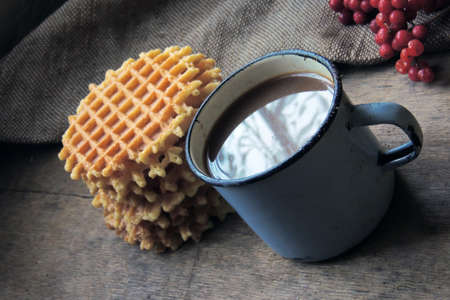 Cup of coffee with Christmas sweetness. Cocoa and cookiesの写真素材