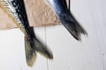 Smoked and salted herring on the Boardの写真素材