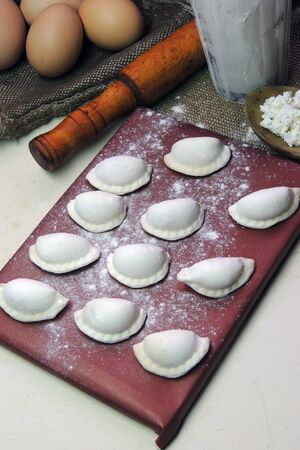 Dumplings with cottage cheese. Prepare homemade dumplingsの写真素材