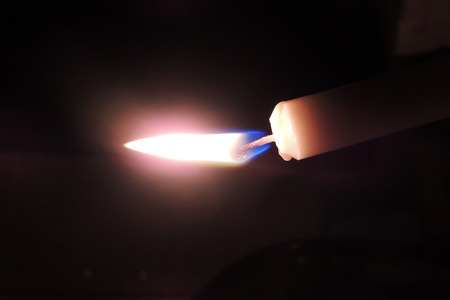 Close up of a burning candle flameの写真素材