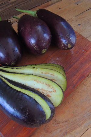 Eggplant on wooden background. Healthy food. Vegetarian.の写真素材