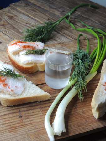 Sandwiches with salted salmon and fresh dill on wooden boardの写真素材