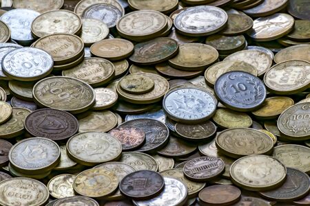 Turkish currency of different years. Metal coins. Retro or vintage money background. Big pile of old...