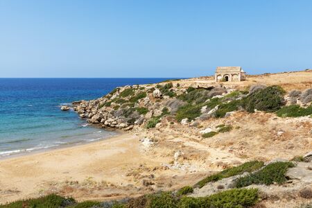 Mediterranean Sea in Northern Cyprus. The ruins of an ancient building on the island. Summer seashore with transparent blue water. Seascape. Skyline. Beautiful natureの写真素材