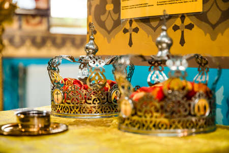 Pokrov, Ukraine - January 24, 2021: Church of St. John Chrysostom. Interior of an Orthodox Ukrainian church. Two crowns for the Sacrament of the Wedding.のeditorial素材