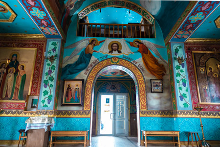 Pokrov, Ukraine - January 24, 2021:Church of St. John Chrysostom. Interior of an Orthodox Ukrainian church. Entrance to the Temple.のeditorial素材