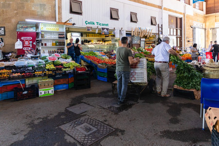 Nicosia, Cyprus - June 28, 2022: Bandabulya Municipal Market in old historical center of nord Nicosia. Workers, salespeople working.のeditorial素材
