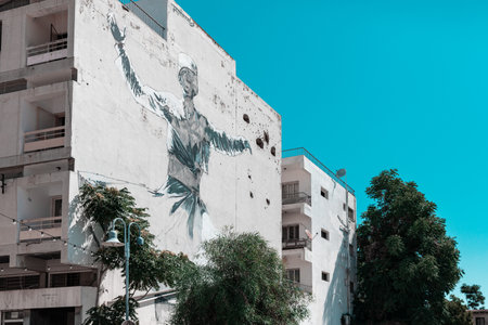 Nicosia, Cyprus - June 28, 2022: Building with a drawing of a whirling dervishのeditorial素材