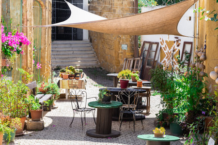 Nicosia, Cyprus - June 28, 2022: Local typical cafe in Bandabulya Municipal Market in old historical center of nord Nicosiaのeditorial素材