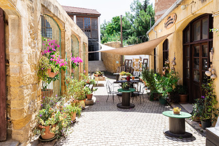 Nicosia, Cyprus - June 28, 2022: Local typical empty cafe in Bandabulya Municipal Market in old historical center of nord Nicosiaのeditorial素材
