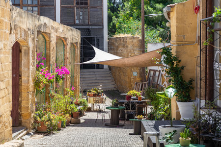 Nicosia, Cyprus - June 28, 2022: Local cafe in Bandabulya Municipal Market in old historical center of nord Nicosiaのeditorial素材