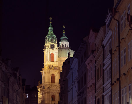 Night View of Illuminated Church in Prague from Charles Bridgeの写真素材