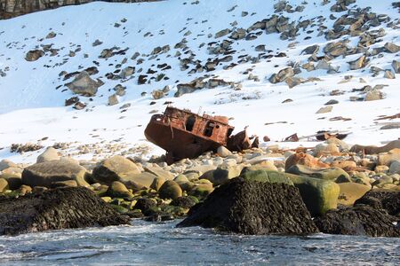 Old ship on the shoreの写真素材