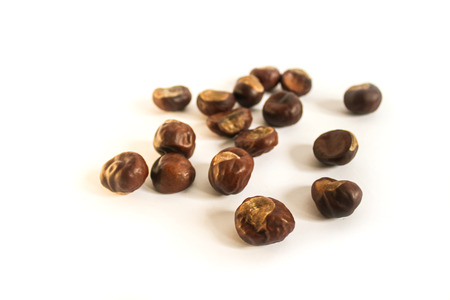 Dried chestnuts on white backgroundの写真素材