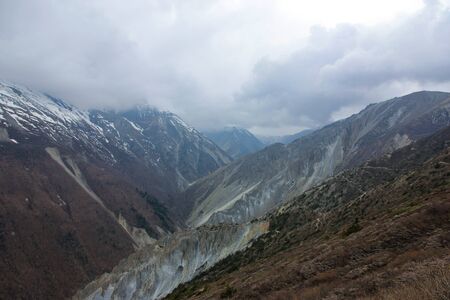 mountains and white clouds and blue skyの写真素材