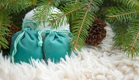 Gift bags under the Christmas tree. Background for New Year and Christmas