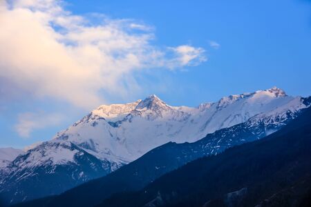 Snowy mountains of Nepal on a background of blue sky. sunny dayの写真素材