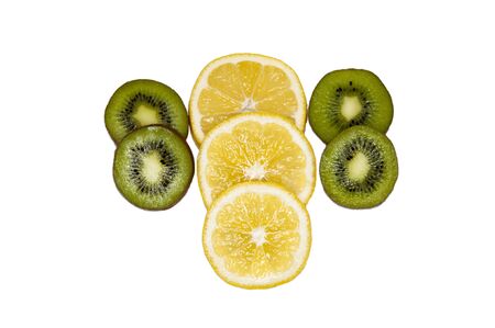 Kiwi and lemon circles on a white backgroundの写真素材