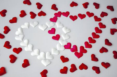 White and red heart on a white backgroundの写真素材