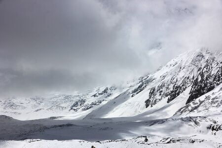 Snow in the mountains. Snowy Mountains in Nepal.