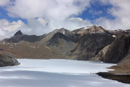 Frozen lake in the mountains of Nepal.の写真素材