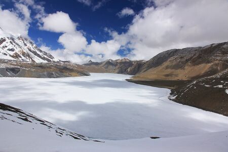 Frozen lake in the mountains of Nepal.の写真素材