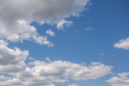 White clouds on a blue sky. Beautiful natural background.の写真素材