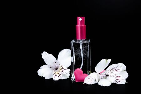 Cosmetic products and body care, face and hair on a black background. Present.の写真素材