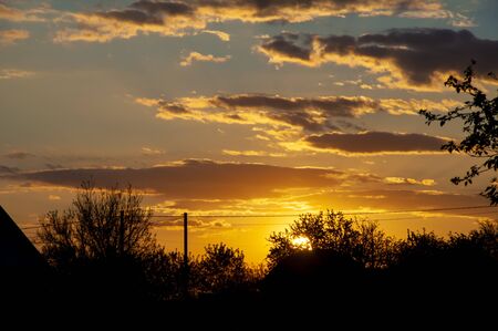 Beautiful sky with clouds at sunset. Beautiful natural backgroundの写真素材