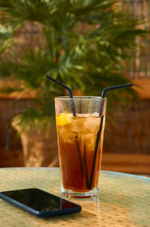 Cocktails on the beach. Bright cold drinks on the beach in summer. Summer vacation and travel concept.の写真素材