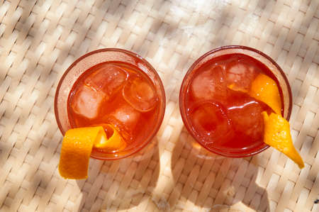 Cocktails on the beach. Bright cold drinks on the beach in summer. Summer vacation and travel concept.の写真素材