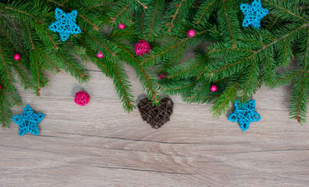 Christmas decorations on a wooden background. Winter holiday theme. Happy New Year. Space for text.の写真素材