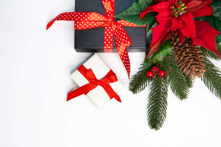 Christmas background with decorations, pine needles and gift boxes
