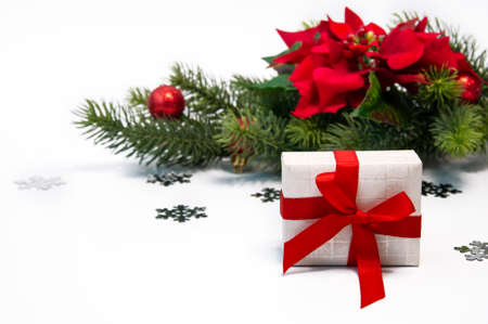 Christmas background with decorations, pine needles and gift boxesの写真素材