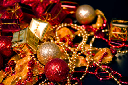 New Year's garland and red yellow boxes with a gift. Christmas backgroundの写真素材