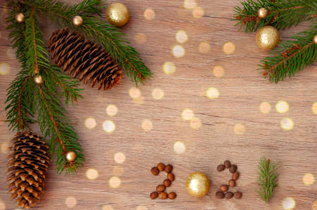 Christmas branches, pine cones, golden balls and a gift box. Christmas decorの写真素材