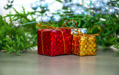 Wrapped gifts under a Christmas tree with copyspace. Christmas holiday picture with copyspaceの写真素材