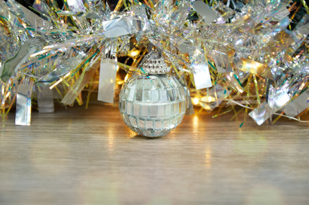Christmas background with silver layer and silver tinselの写真素材
