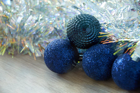Blue Christmas balls in silver tinsel. Christmas backgroundの写真素材