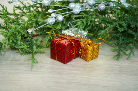 Wrapped gifts under a Christmas tree. Christmas holiday picture with copyspaceの写真素材