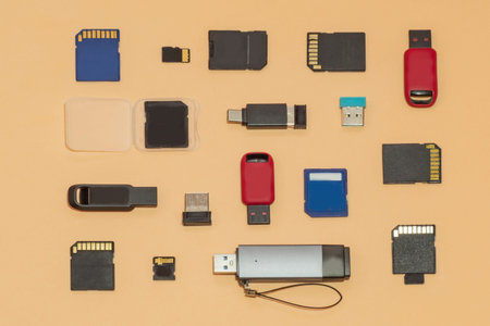 Collection of USB flash drives, SD and microSD memory cards, flat lay. Digital storage, data...
