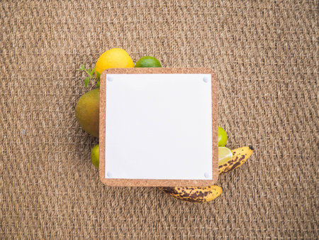 Close-up top view of tropical fruits and sign with space for a textの写真素材