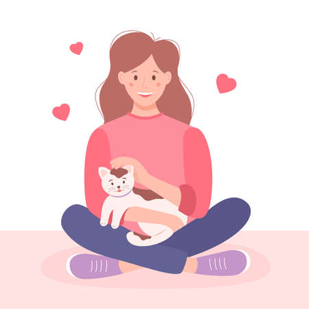 Young woman and pet, flat style. Happy girl holding a cat in her arms. Cute vector illustration.のイラスト素材