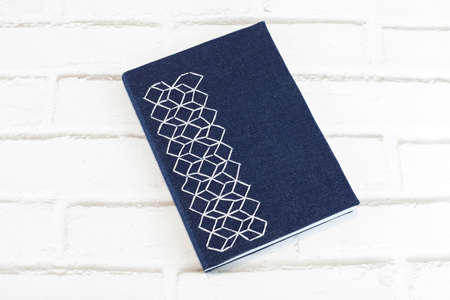 Handmade notebook with hexagonal embroidery fabric cover