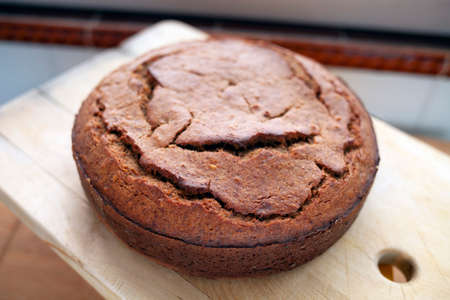 Pastries, home made banana cake ready for eat on a wooden background.の写真素材